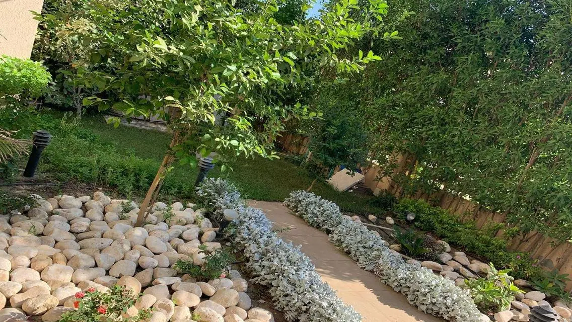 Luxury Villa for Sale with Private Garden and Shared Pool