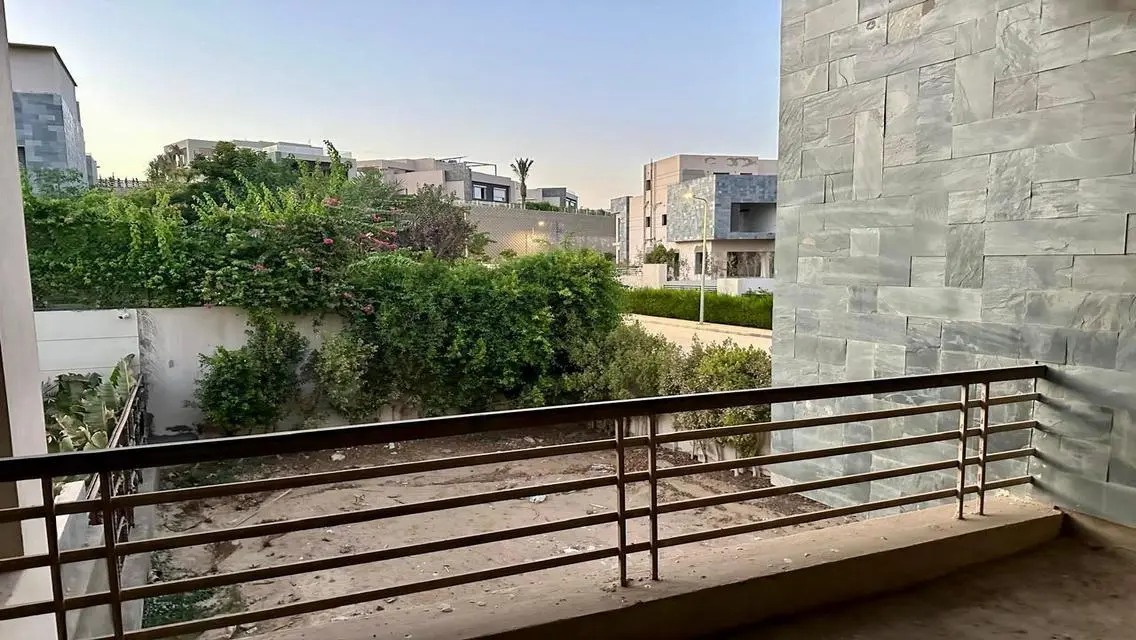 Luxury Apartment with Private Garden and Shared Pool in Prime Location