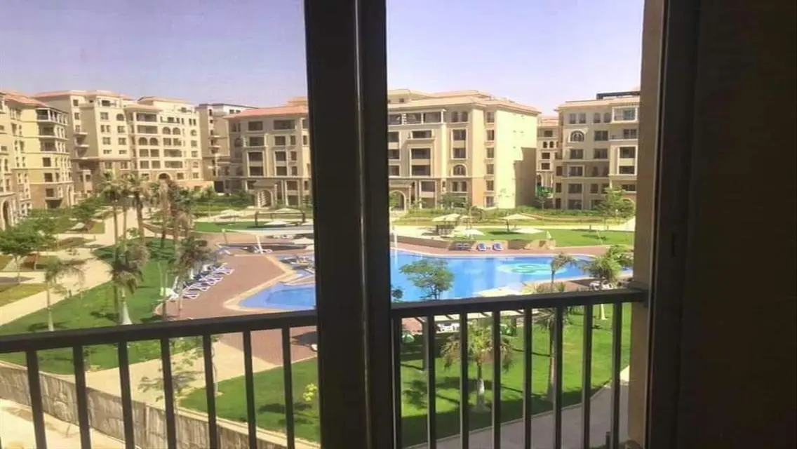 Luxurious Apartment for Sale in AUC with Private Garden and Shared Pool