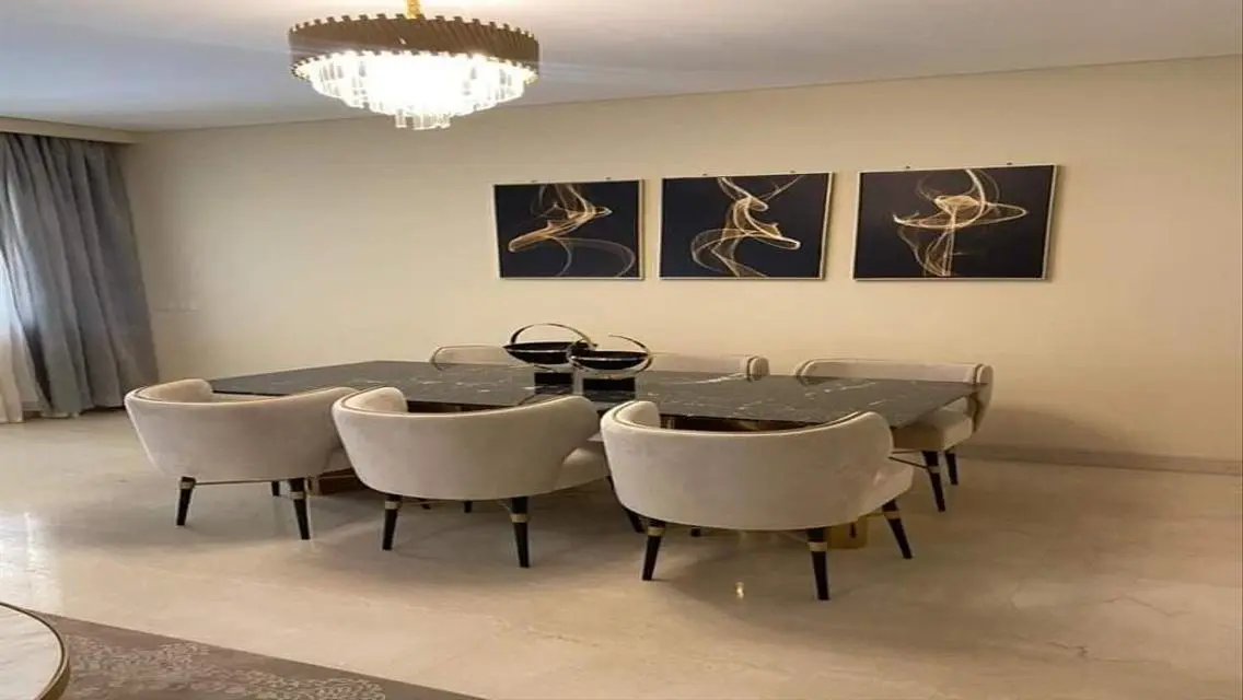 Luxurious Apartment for Sale in AUC with Private Garden and Shared Pool