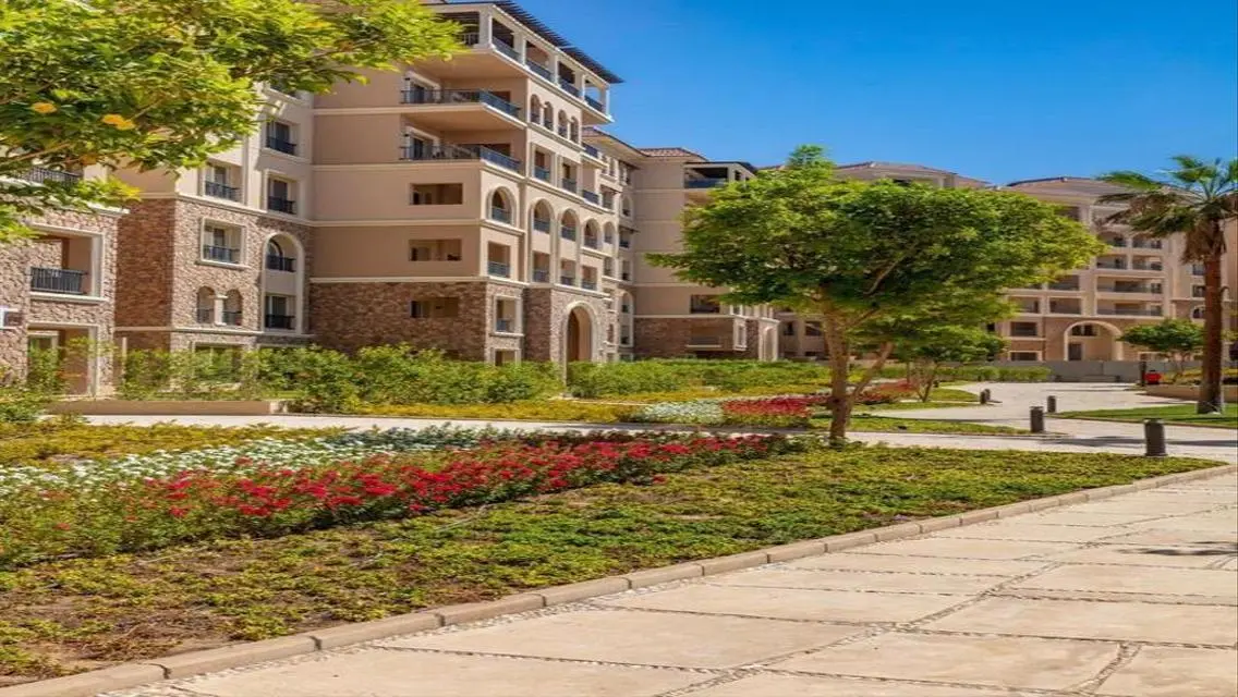 Luxurious Apartment for Sale in AUC with Private Garden and Shared Pool