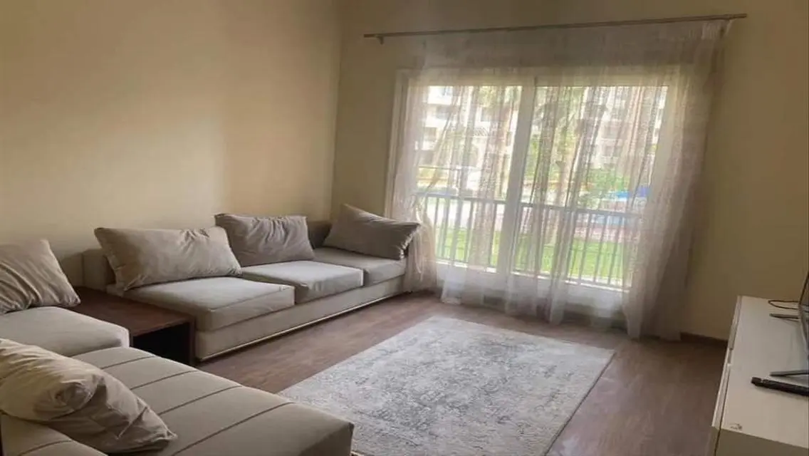 Luxurious Apartment for Sale in AUC with Private Garden and Shared Pool