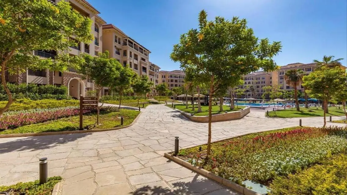 Luxurious Apartment for Sale in AUC with Private Garden and Shared Pool