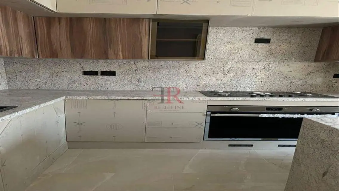 Luxury Apartment with Balcony and Private Garden in Prime Location