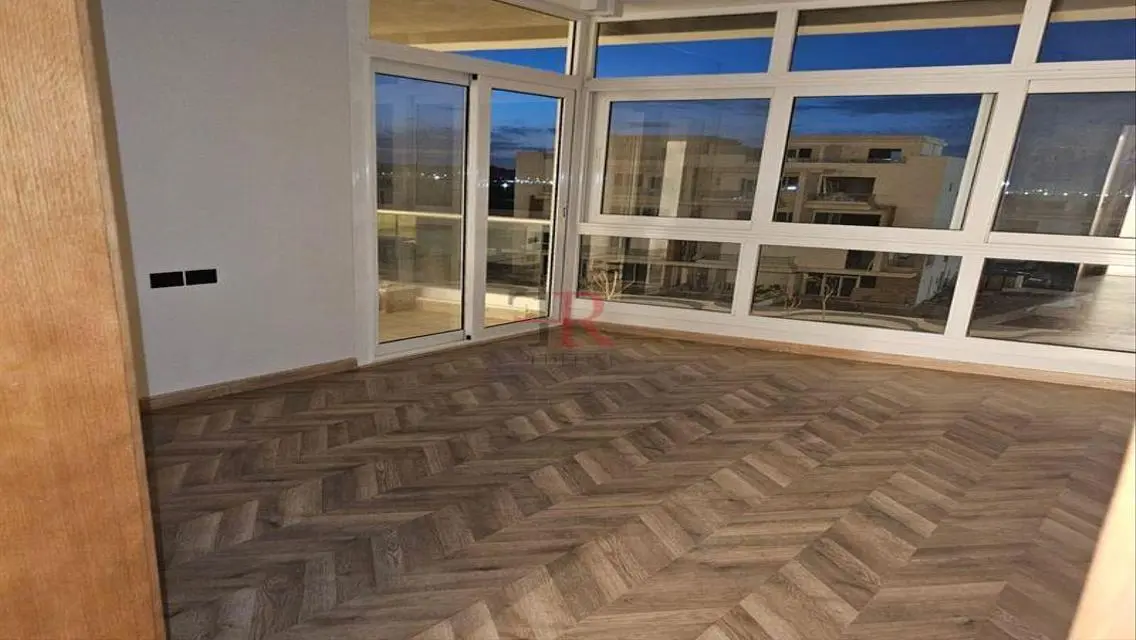 Luxury Apartment with Balcony and Private Garden in Prime Location