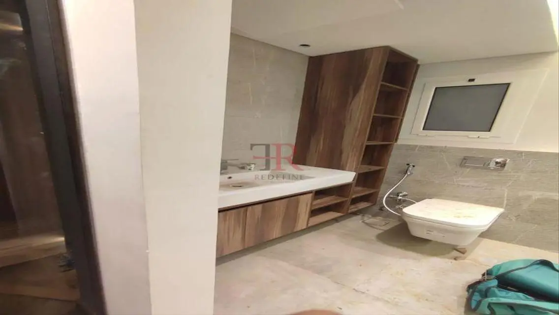 Luxury Apartment with Balcony and Private Garden in Prime Location