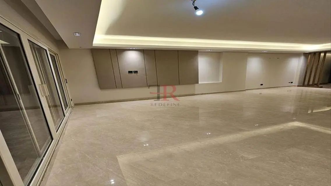 Luxury Apartment with Balcony and Private Garden in Prime Location