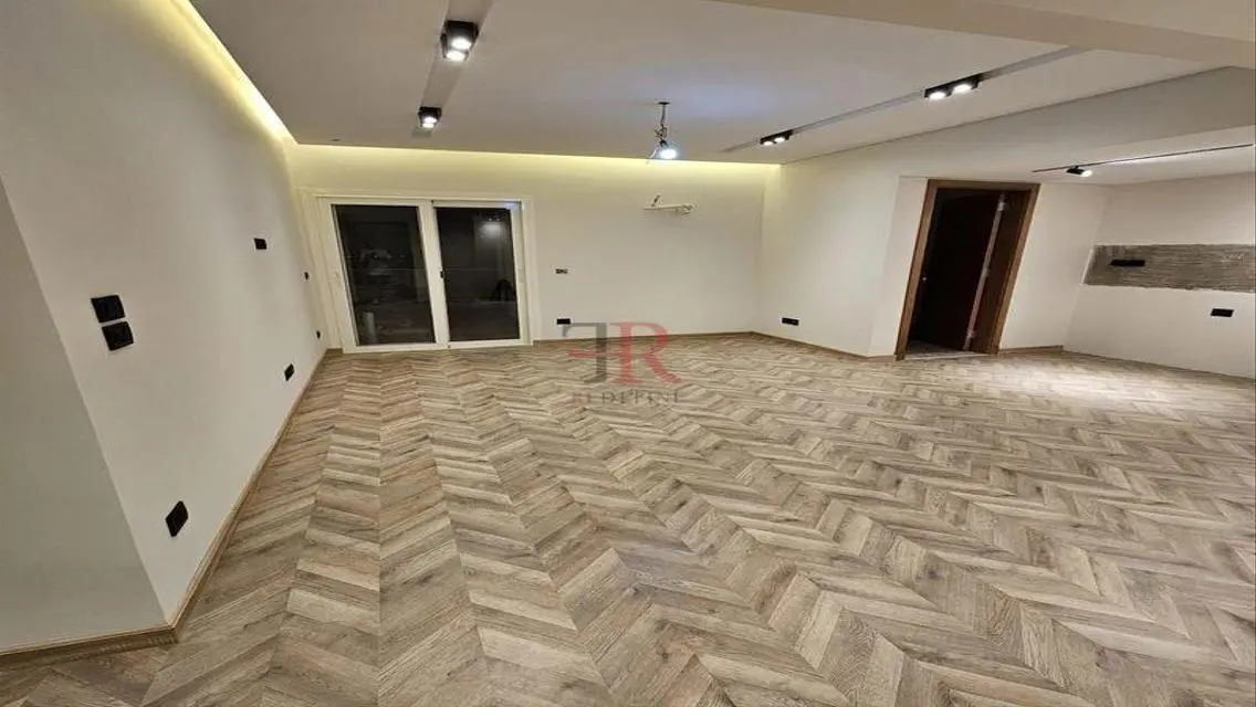 Luxury Apartment with Balcony and Private Garden in Prime Location