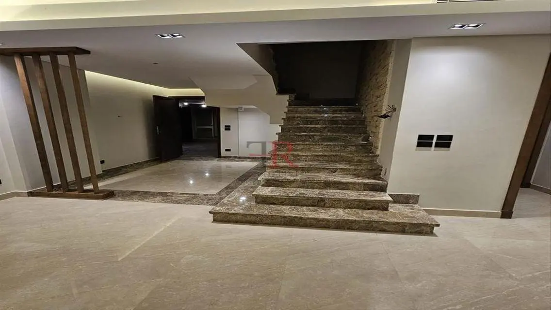 Luxury Apartment with Balcony and Private Garden in Prime Location