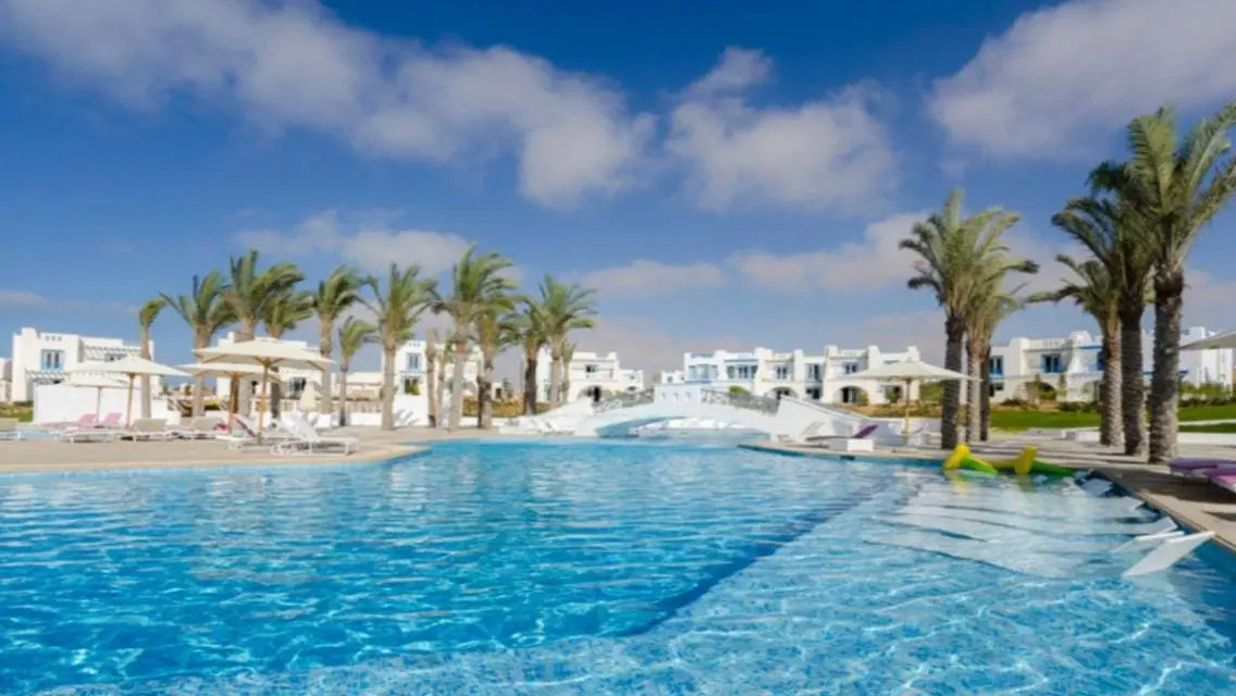 Luxury Villa with Private Garden and Shared Pool in Prime Location