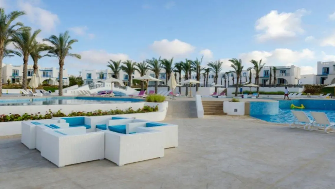 Luxury Villa with Private Garden and Shared Pool in Prime Location
