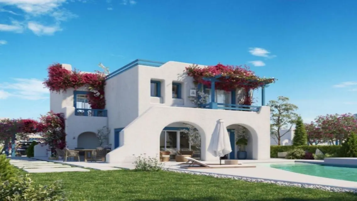 Luxury Villa with Private Garden and Shared Pool in Prime Location