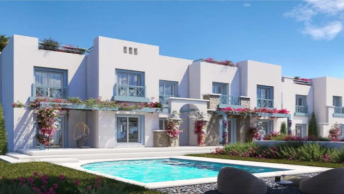 Luxury Villa with Private Garden and Shared Pool in Prime Location