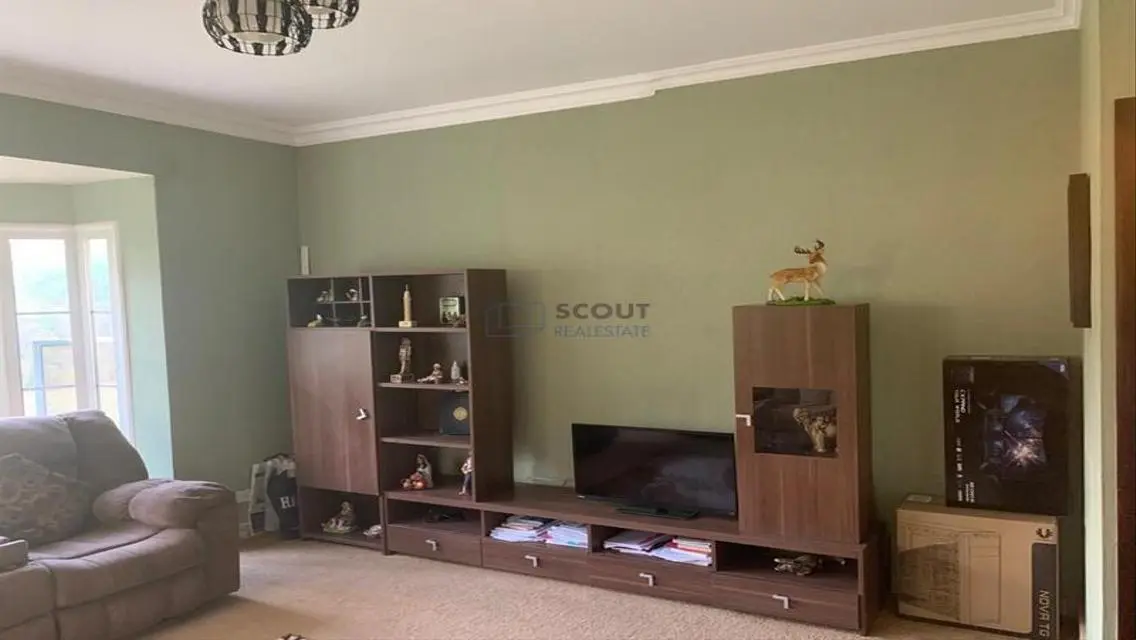 Luxury 4-Bedroom Apartment with Balcony and Shared Pool