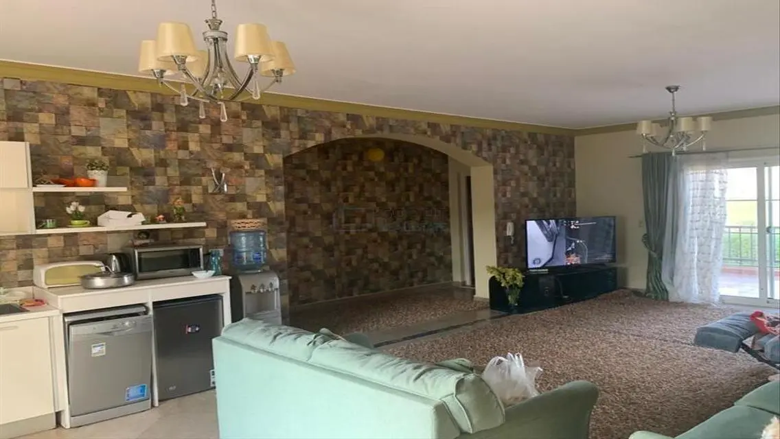 Luxury 4-Bedroom Apartment with Balcony and Shared Pool