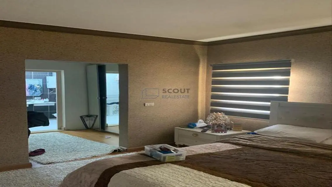Luxury 4-Bedroom Apartment with Balcony and Shared Pool