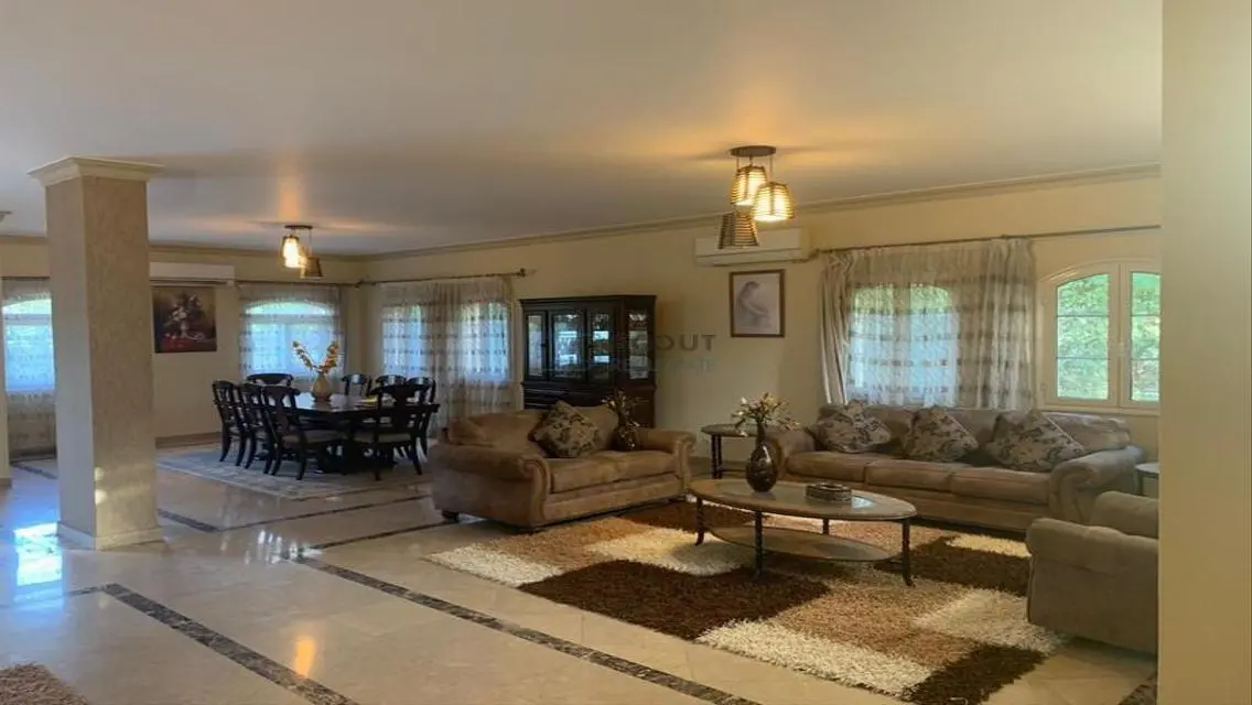 Luxury 4-Bedroom Apartment with Balcony and Shared Pool