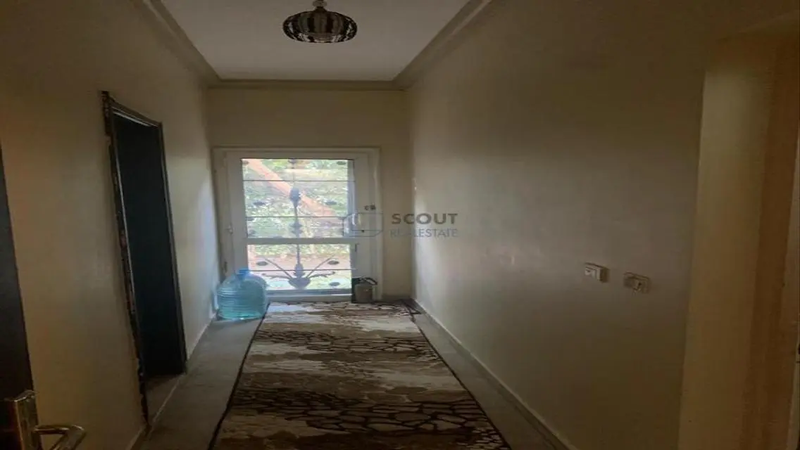 Luxury 4-Bedroom Apartment with Balcony and Shared Pool