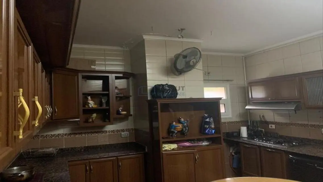 Luxury 4-Bedroom Apartment with Balcony and Shared Pool