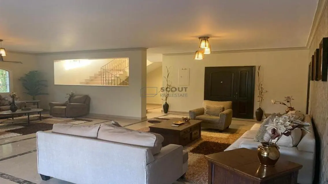Luxury 4-Bedroom Apartment with Balcony and Shared Pool