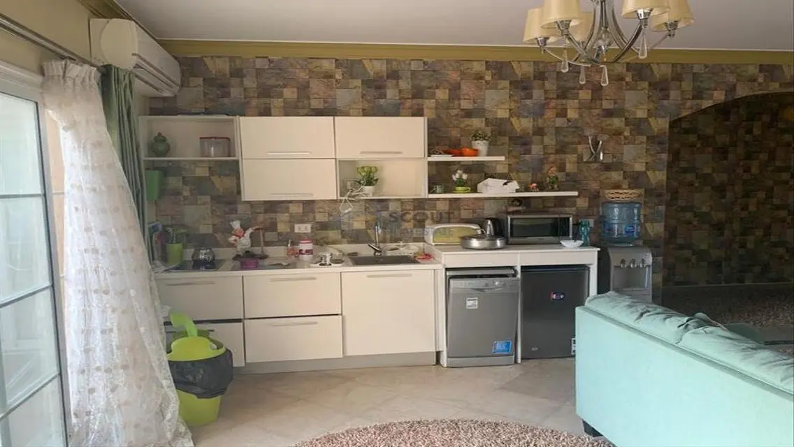 Luxury 4-Bedroom Apartment with Balcony and Shared Pool