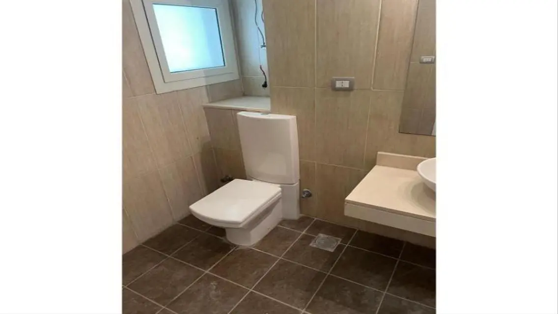 Apartment for Sale in Village Gate Compound - Palm Hills
