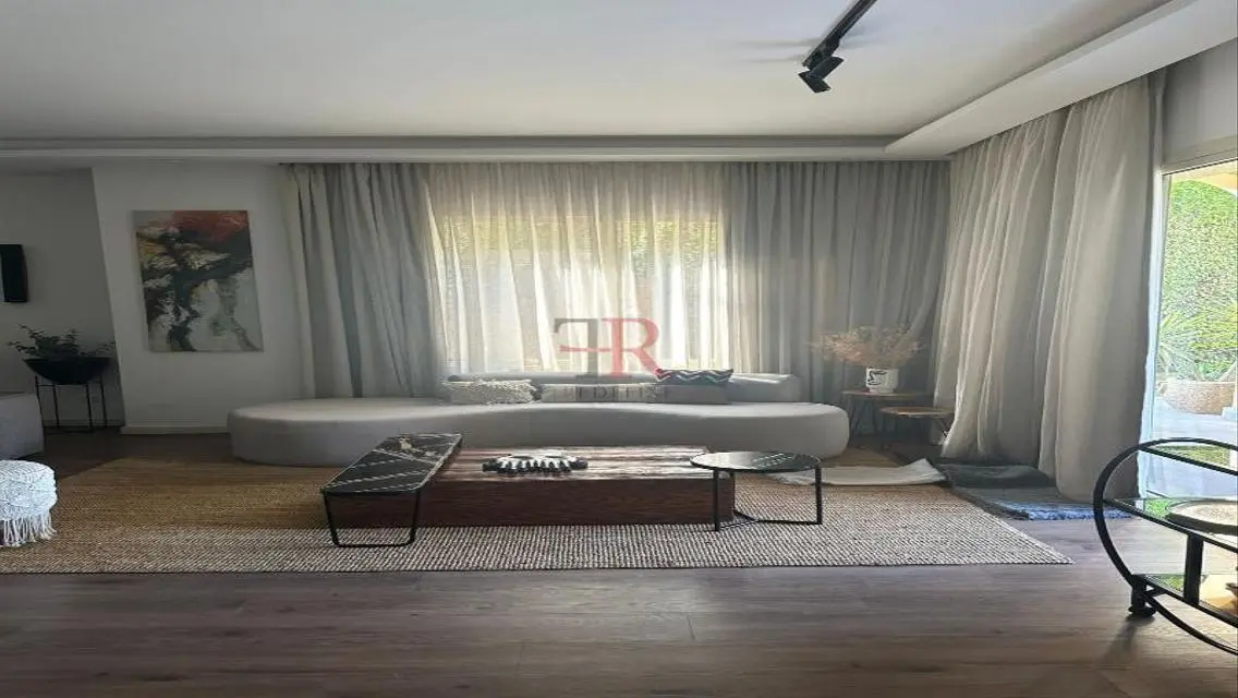 Luxury Apartment for Sale with Spacious Layout and Private Garden