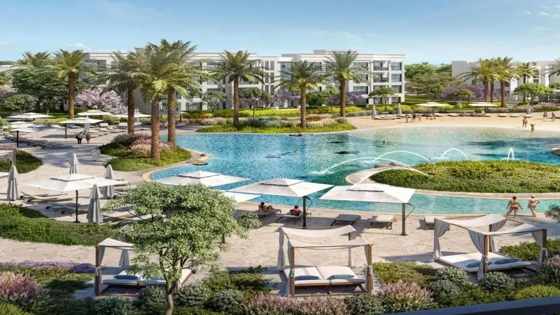 Luxury 4-Bedroom Apartment with Private Garden and Shared Pool