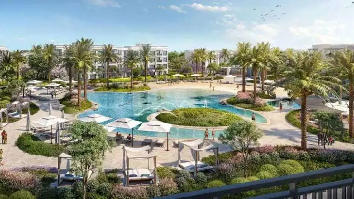 Luxury 4-Bedroom Apartment with Private Garden and Shared Pool