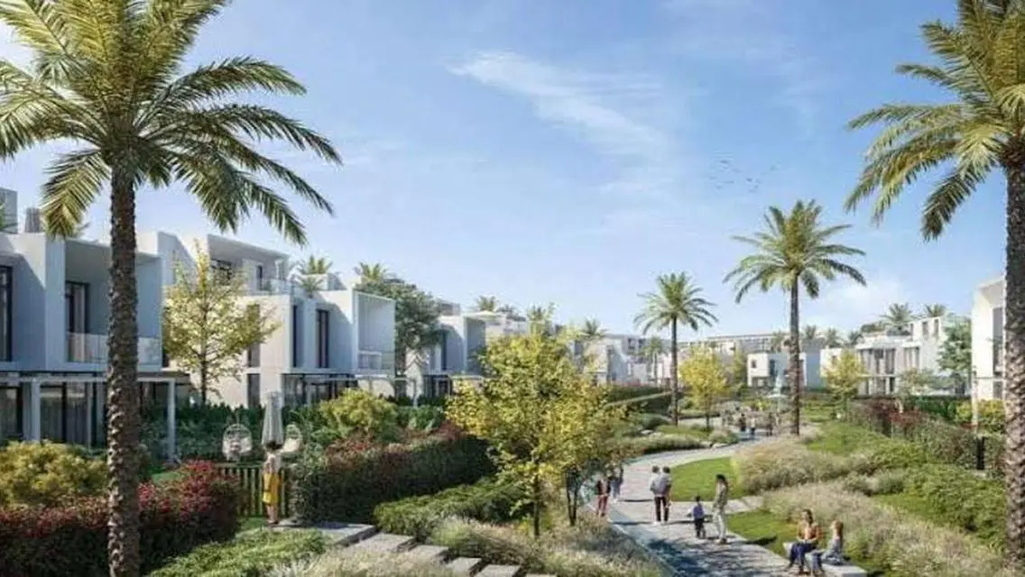 Luxury 4-Bedroom Apartment with Private Garden and Shared Pool
