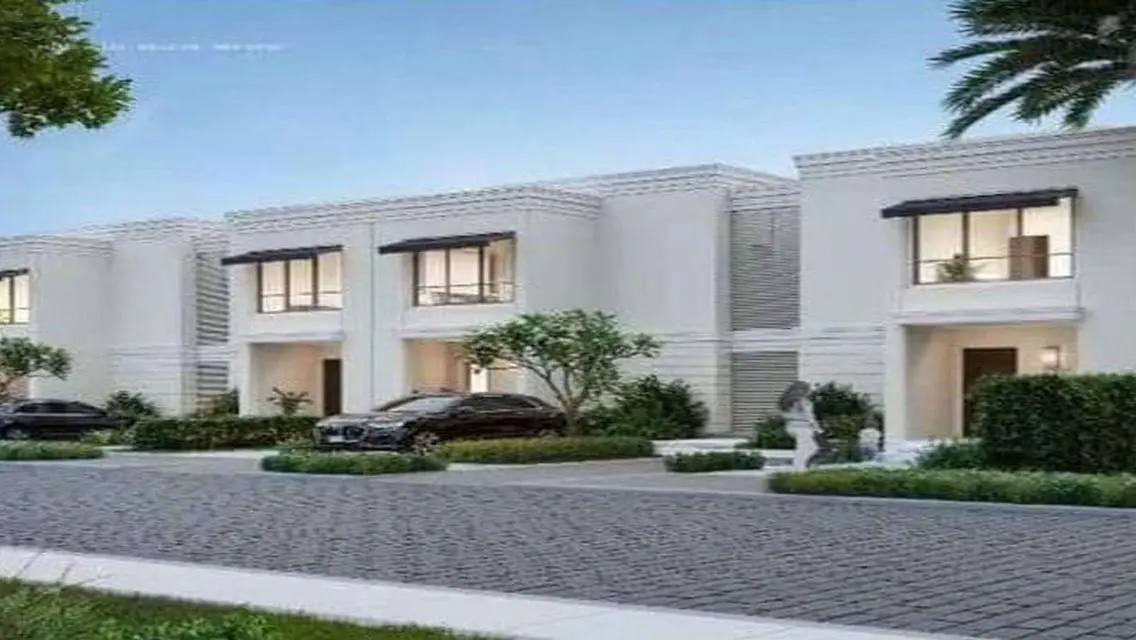 Luxury 4-Bedroom Apartment with Private Garden and Shared Pool