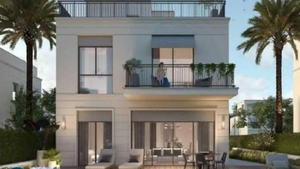 Luxury 4-Bedroom Apartment with Private Garden and Shared Pool