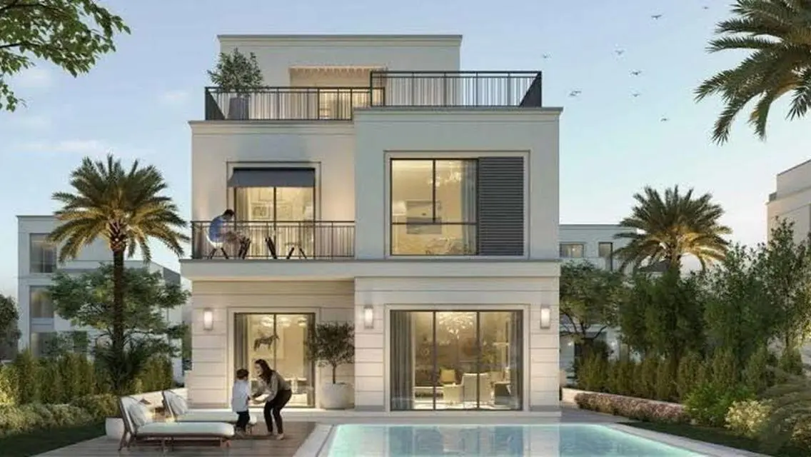 Luxury 4-Bedroom Apartment with Private Garden and Shared Pool