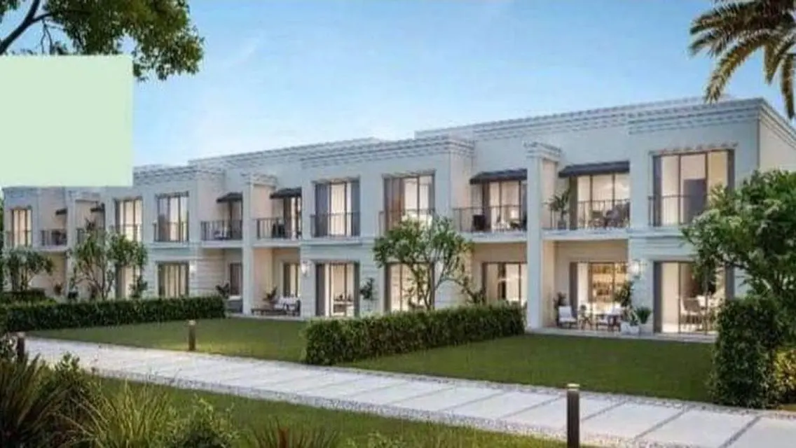 Luxury 4-Bedroom Apartment with Private Garden and Shared Pool