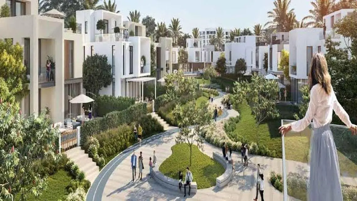 Luxury 4-Bedroom Apartment with Private Garden and Shared Pool