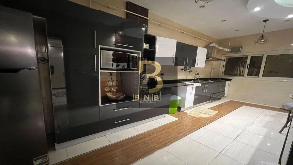 Luxurious 5-Bedroom Apartment with Private Garden and Lake View