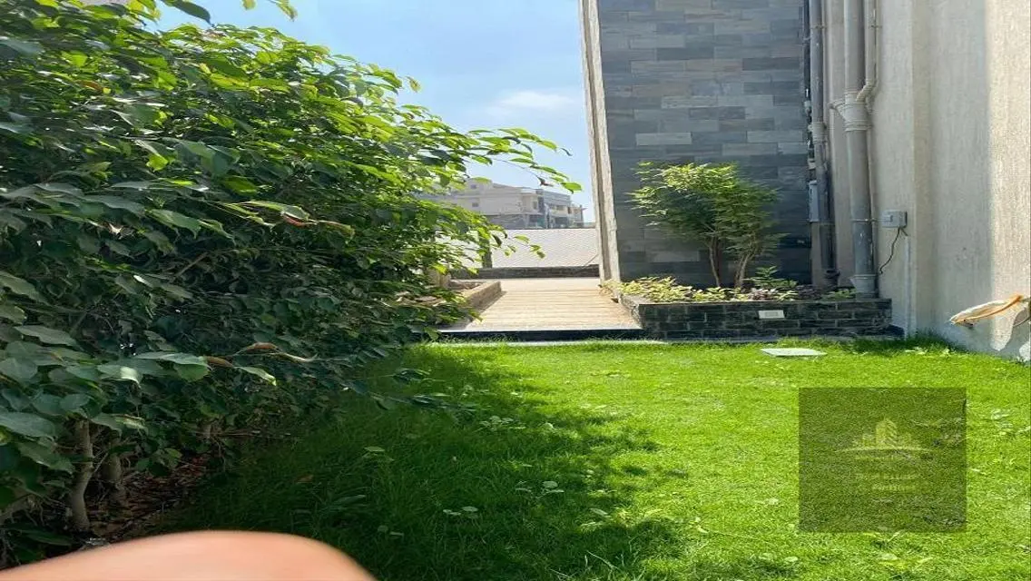 Luxury Apartment with Garden and Shared Pool