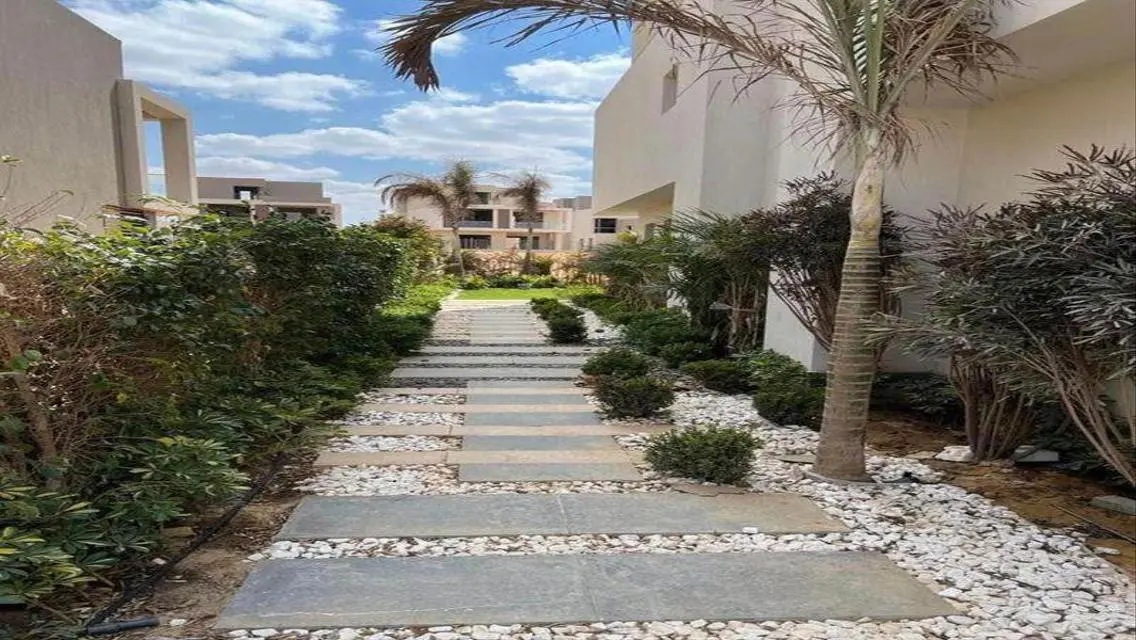 Luxury Apartment with Private Garden and Shared Pool
