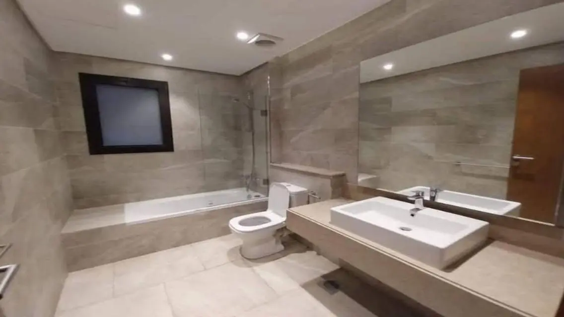 Luxurious Villa with Private Garden and Shared Pool for Sale