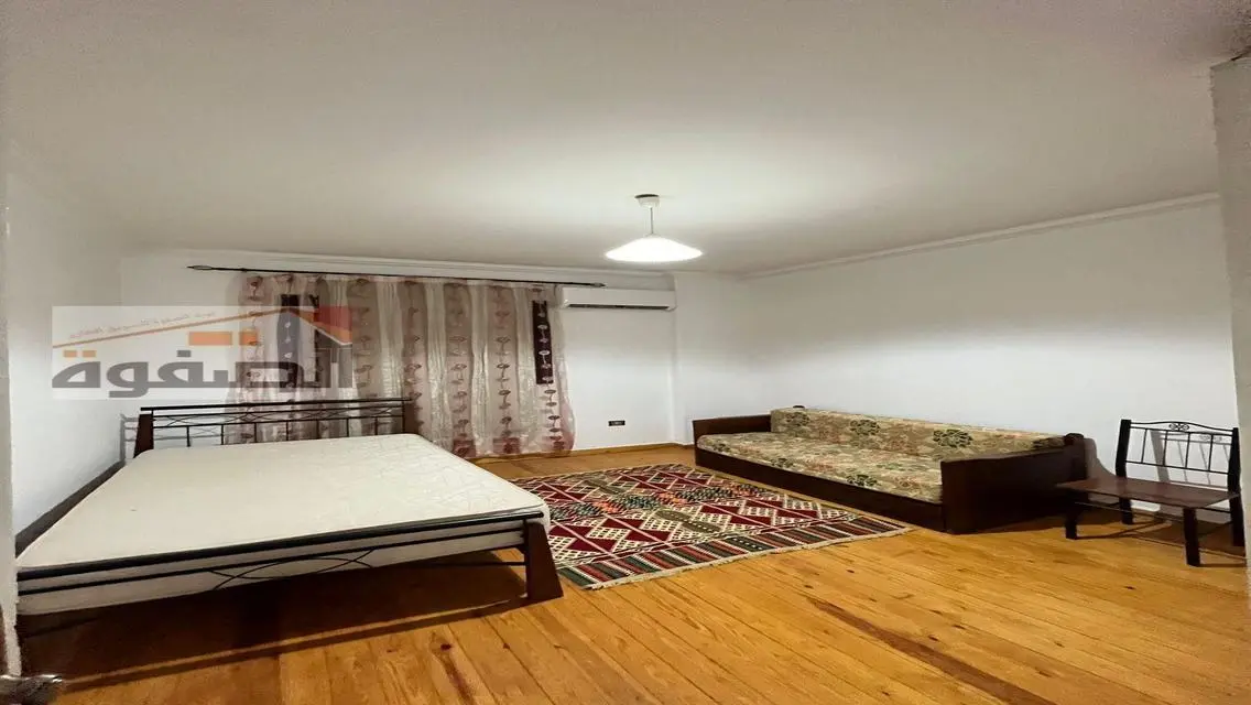 Spacious Apartment for Rent with Kitchen Facilities and Balcony
