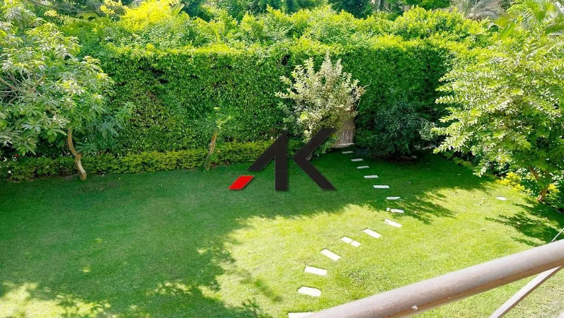 Luxury 4-Bedroom Apartment with Private Garden and Pool