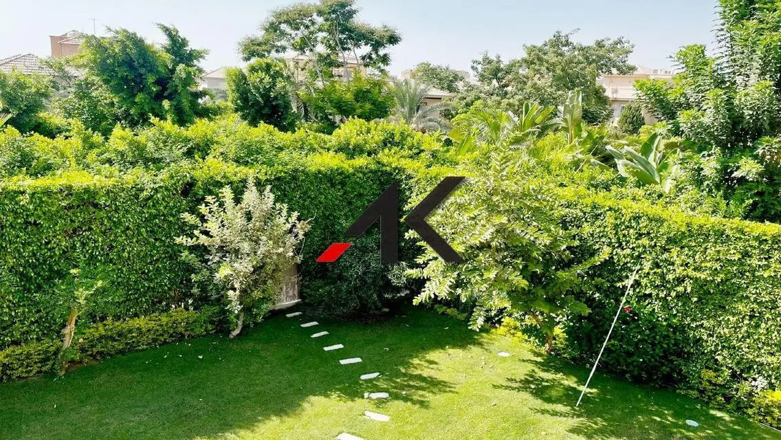 Luxury 4-Bedroom Apartment with Private Garden and Pool