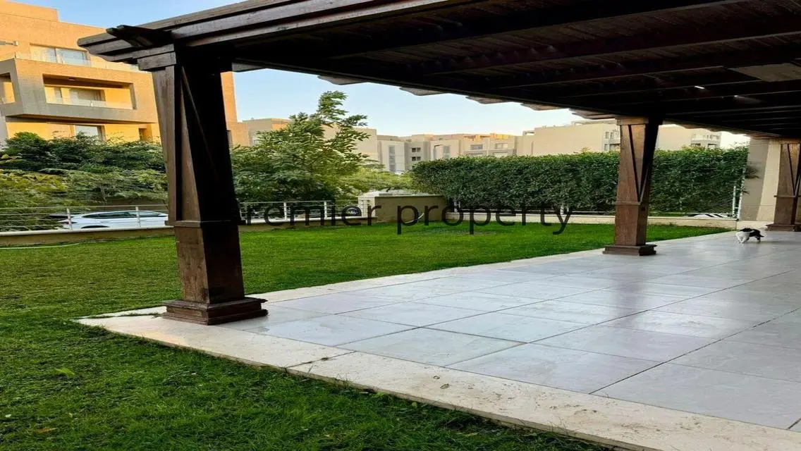 Stunning Apartment with Private Garden and Covered Parking for Sale