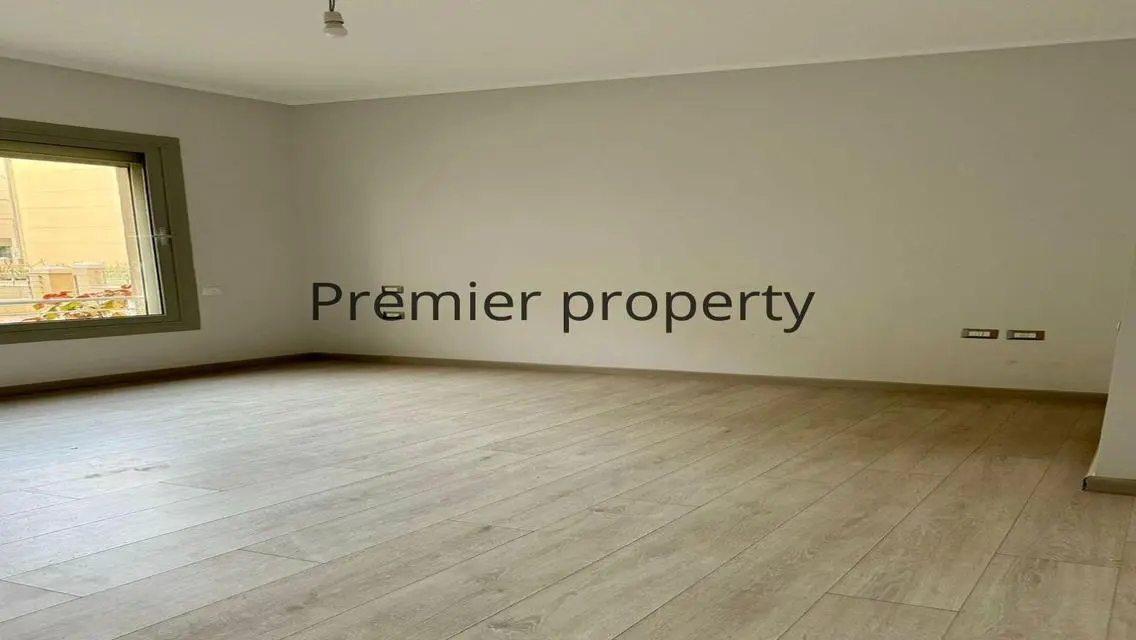 Stunning Apartment with Private Garden and Covered Parking for Sale