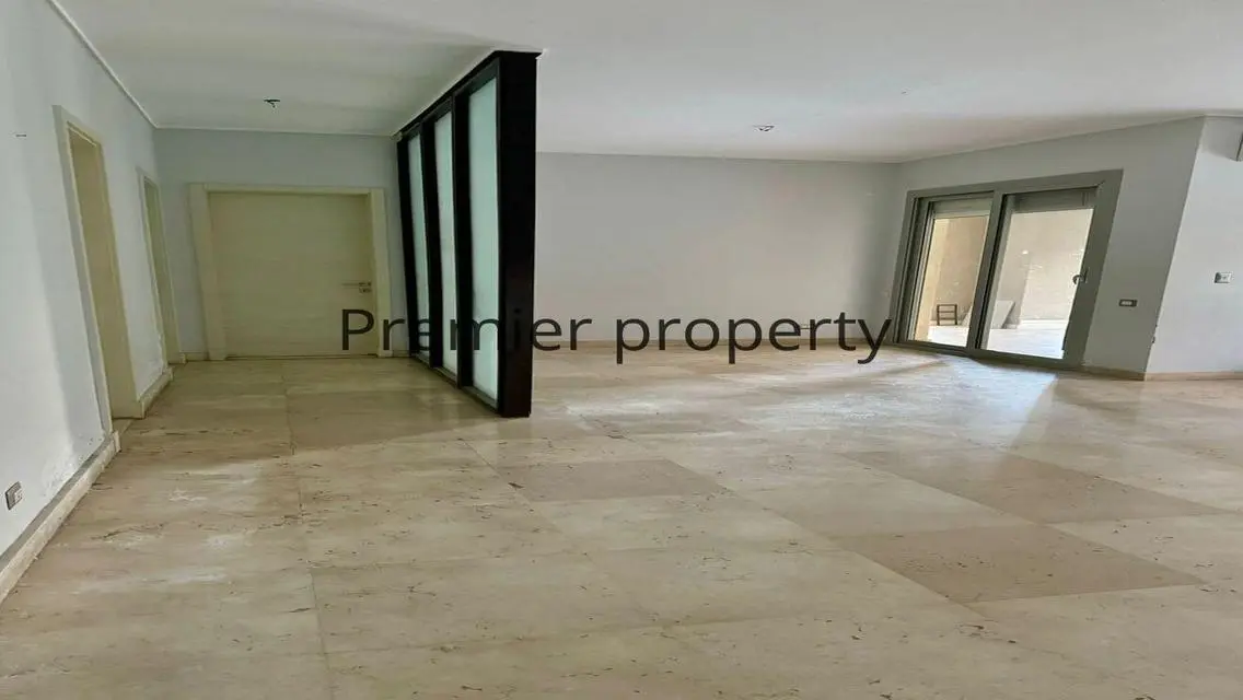 Stunning Apartment with Private Garden and Covered Parking for Sale