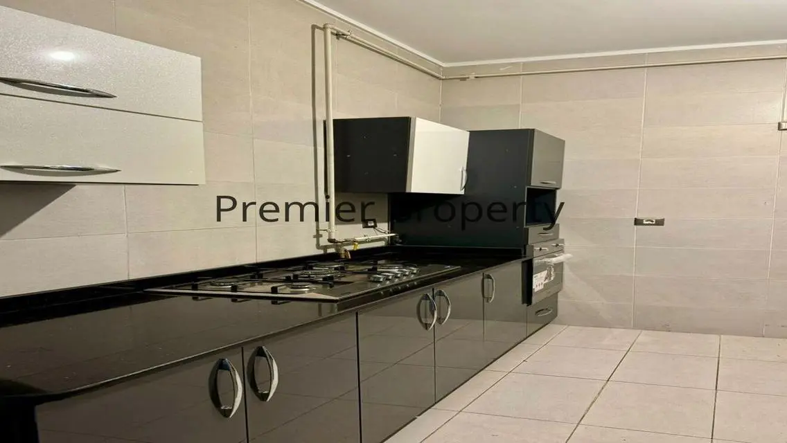 Stunning Apartment with Private Garden and Covered Parking for Sale