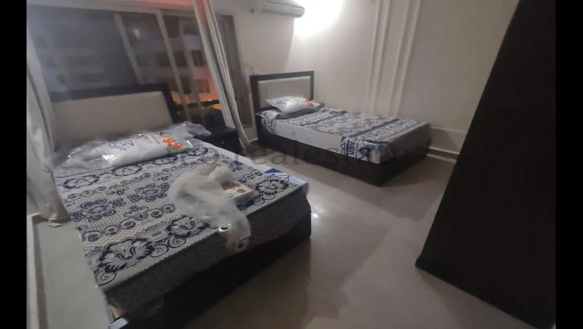 Apartment with Kitchen Amenities and Balcony at TEO REALESTATE