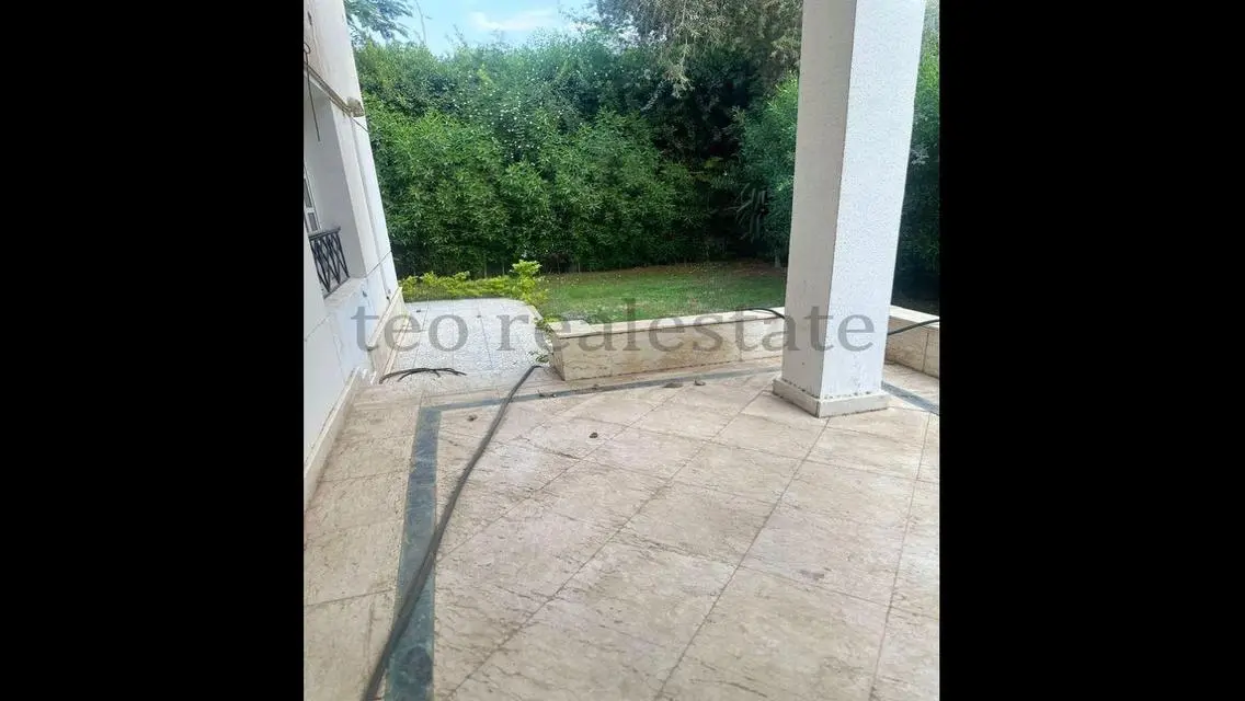 Luxurious Property with Private Garden and Maid's Room in Prime Location