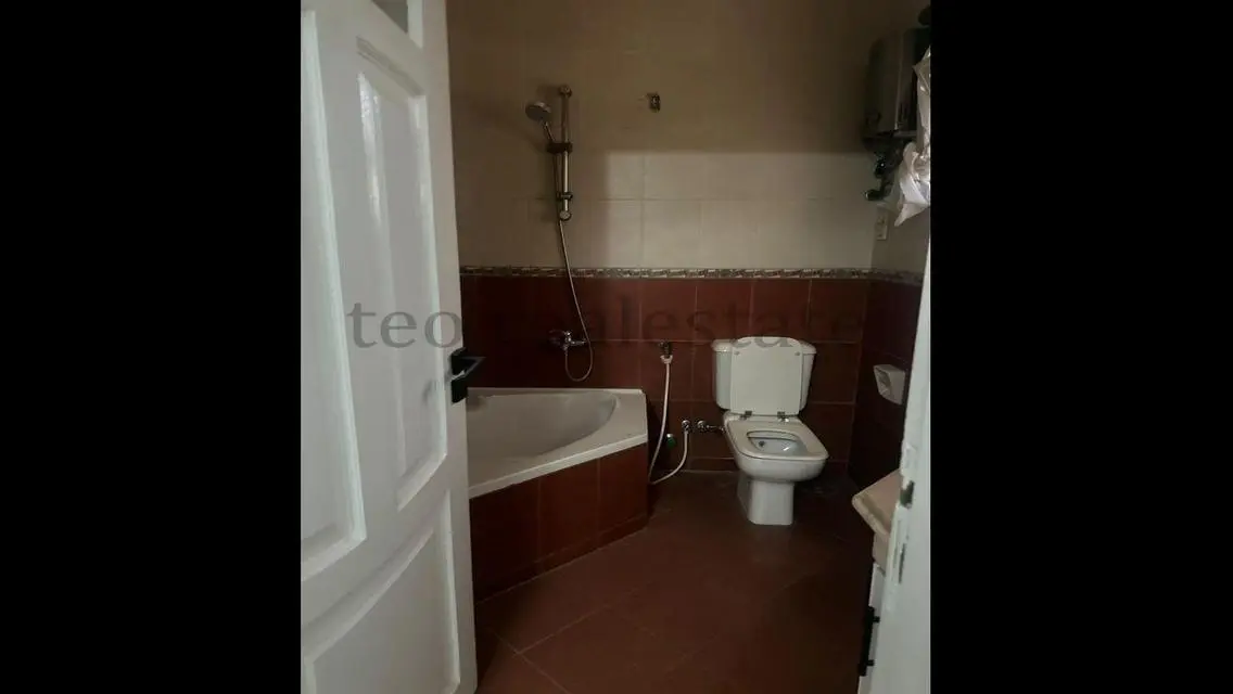 Luxurious Property with Private Garden and Maid's Room in Prime Location