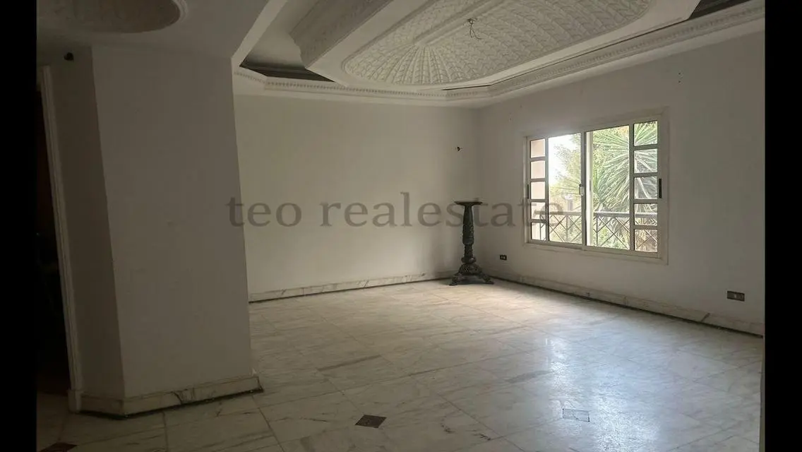 Luxurious Property with Private Garden and Maid's Room in Prime Location